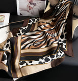 Brown tan and black and cream animal print scarf
