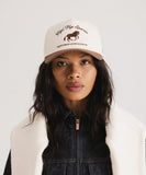 A woman wearing gigi-sports-vintage-trucker front view